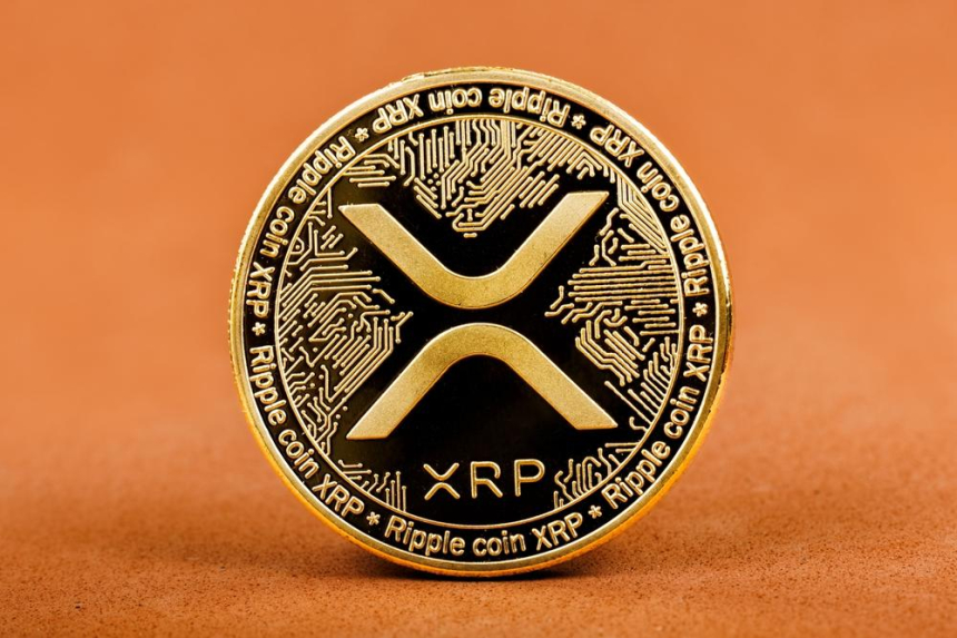 리플 CEO 타투 공개로 XRP 2.19달러 급등, SEC 소송 완전 종료